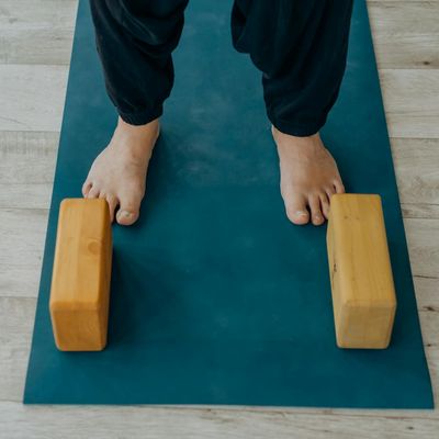 Yoga accessories like straps and blocks on floor